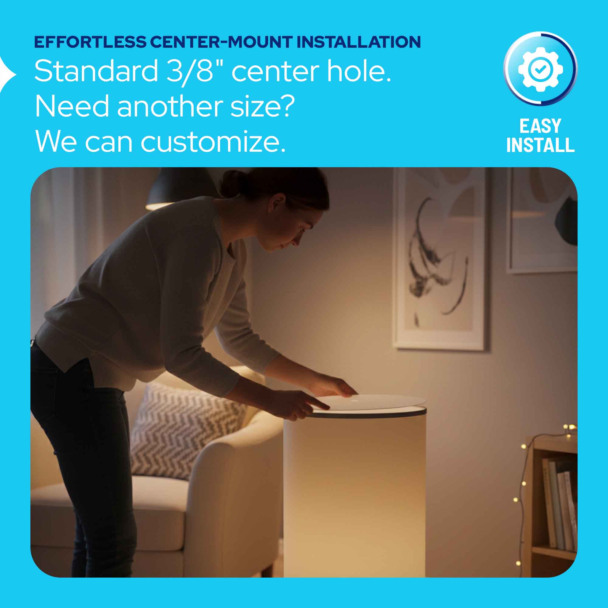 A promotional graphic for a cylindrical floor lamp with text reading 'EFFORTLESS CENTER-MOUNT INSTALLATION' and 'Standard 3/8" center hole. Need another size? We can customize.